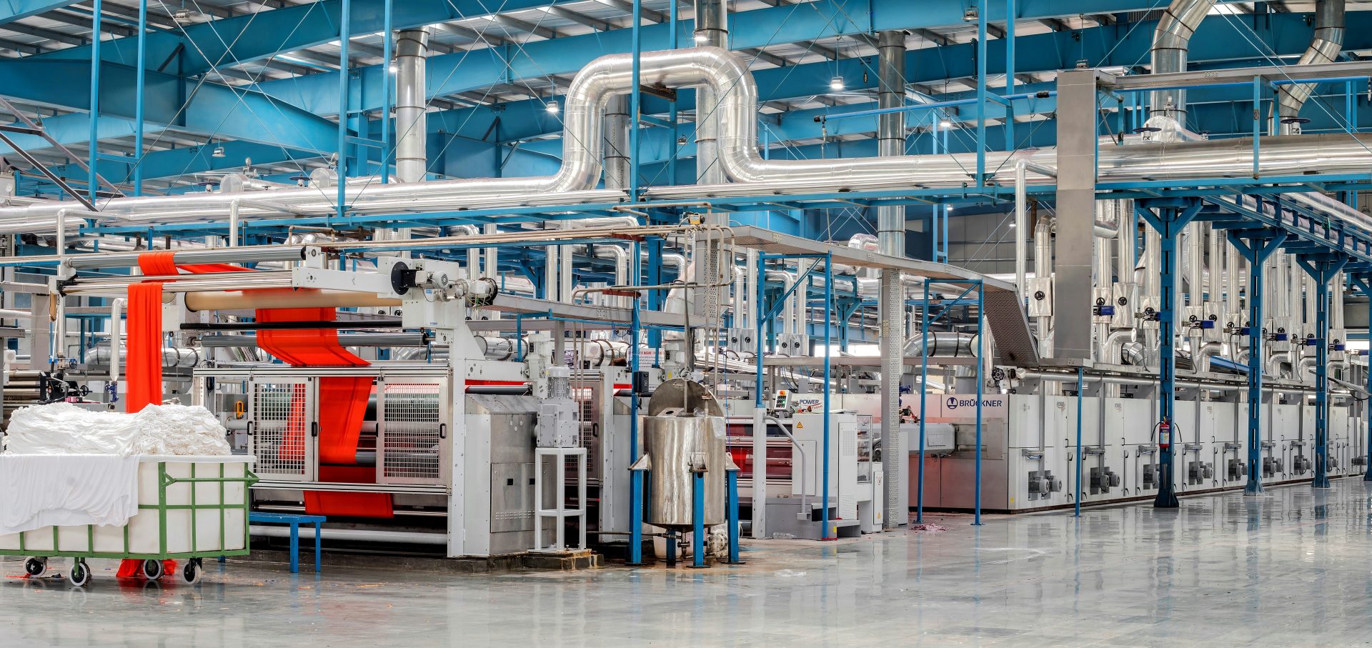 industrial textile factory with machinery and pipes