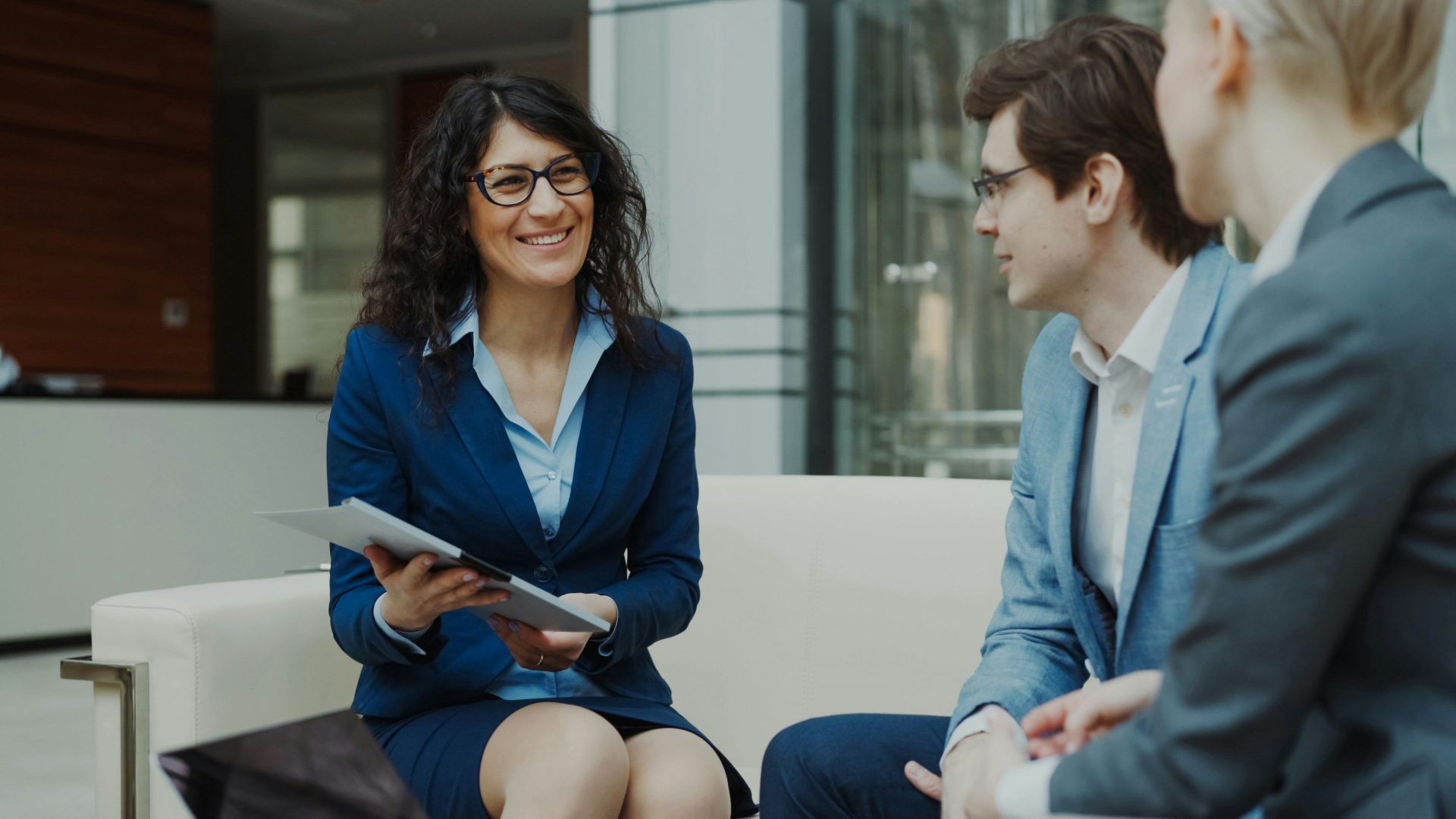 Three business people in a meeting